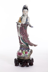 Guanyin statue on white background.