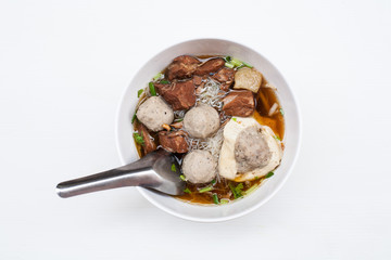 Thai noodle with beef pork and meatball on white background 