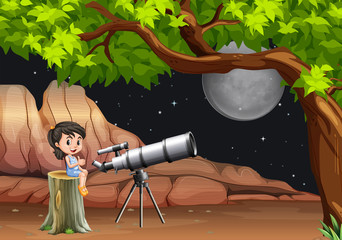 Girl looking at stars and moon through telescope © blueringmedia