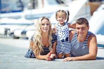 family near the yachts 