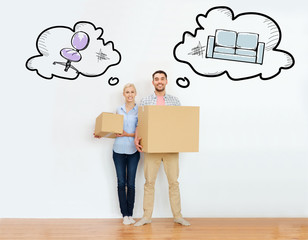 couple with cardboard boxes moving to new home