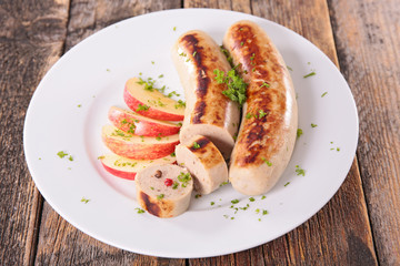 bratwurst and apple