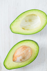 avocado on wooden surface