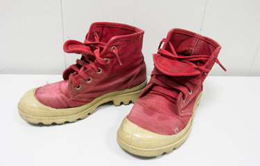 red shoes on a wooden floor