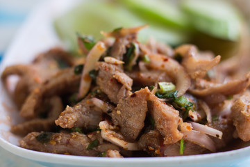 Sliced grilled pork salad
