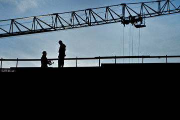 Construction workers silhouettes