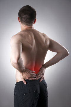 Man with backache. Pain in the human body