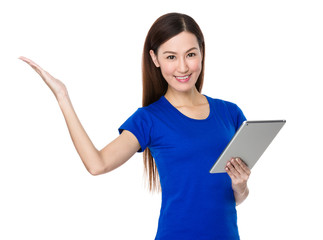Asian Young Woman use of the tablet and hand showing blank sign
