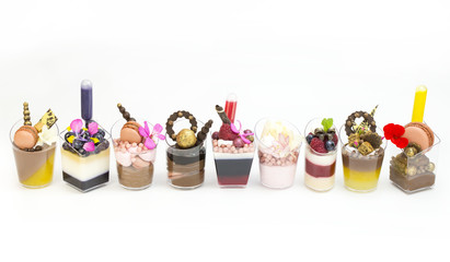 Dessert Canapes with cream chocolate berries, on a white background