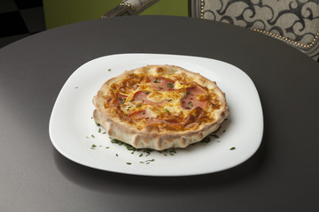 baked bun with ham and eggs