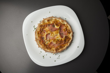 baked bun with ham and eggs