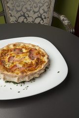 baked bun with ham and eggs