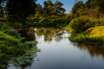 Fototapeta na wymiar Landscape with the river creek