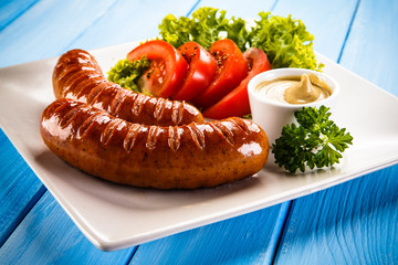 Grilled sausages and vegetables 
