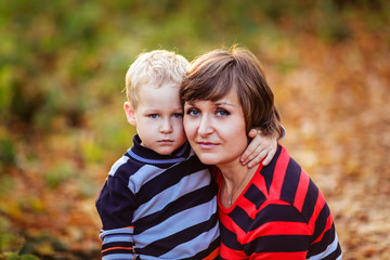 Fototapeta premium Mother and son communicate, park