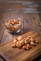 Cashew nut on wood texture