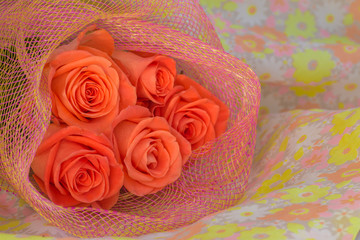 Beautiful wedding bouquet of coral roses