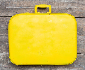 Old yellow suitcase