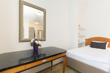 Interior of a classic styled apartment with wooden furniture