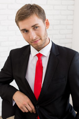 Young handsome man in formal suit