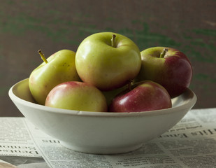 Still life of a bowl of crab apples