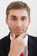 Young handsome man in formal suit