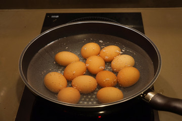 eggs boil in pot