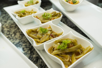 marinated vegetables in portioned plates