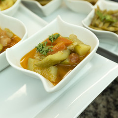marinated vegetables in portioned plates