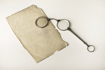 Old pince-nez on very old blank paper