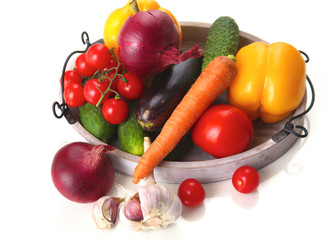 Fresh autumn vegetables on a white background