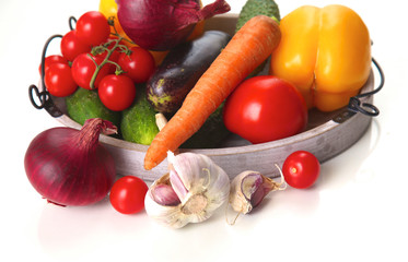 Fresh autumn vegetables on a white background
