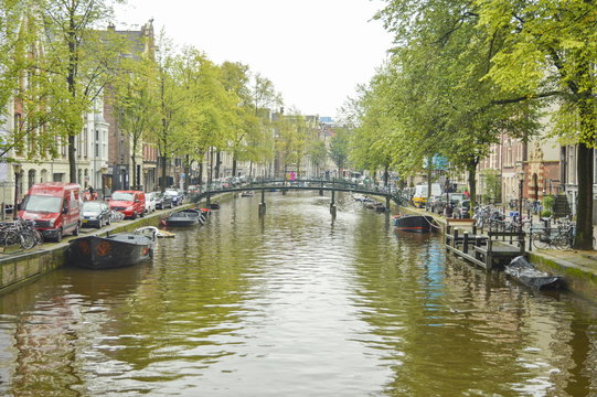 Amsterdam city canal on a cloudy autumn day