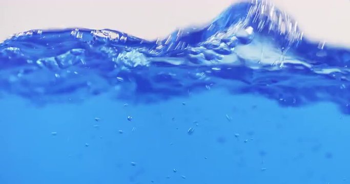 blue water waves in aquarium slow motion