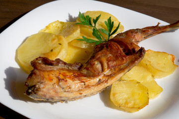 roast leg of rabbit with potatoes
