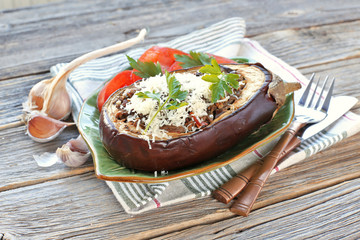 stuffed eggplant with parmesan, parsley, tomatoes, garlic.