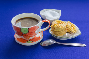 lovely cup of hot coffee with cookie and sugar in set with easy and relax feeling