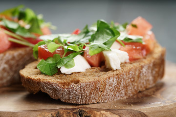 rye bruschetta with mozzarella, tomatoes and parsley