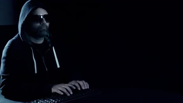 Internet hacker typing on keyboard, shot in raw 4k