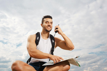 Young man tourist with a backpack