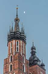 Fototapeta na wymiar Medieval helmets of the towers of the St Mary's (Mariacki) church in Krakow, Poland.
