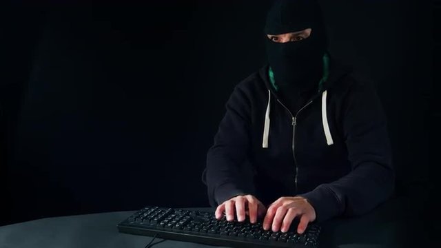 Hacker instaling virus in attacked system network