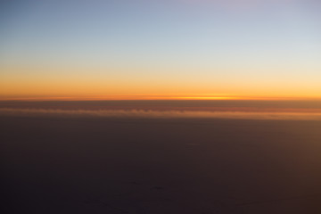 Fototapeta na wymiar sunset view from the airplane