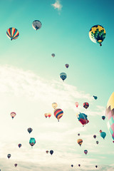 Vintage hot air balloons in flight