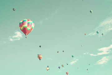 Vintage hot air balloons in flight