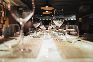 Wine glasses on a table in a restaurant