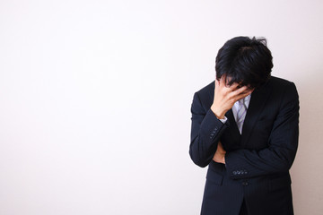 young asian businessman on white background