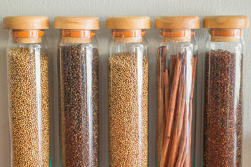 Assortment of spices in glass bottles