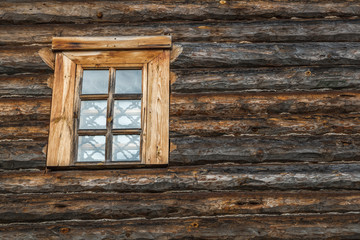 Naklejka na ściany i meble A wooden wall with window