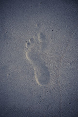 Obraz premium Retro ingle foot print on sand